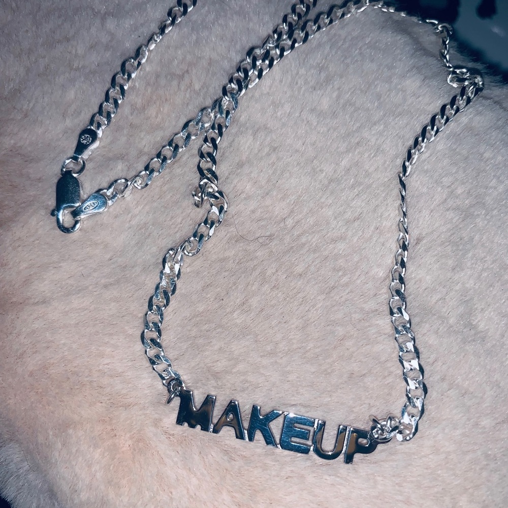 Sterling Silver “MAKEUP” name style necklace.